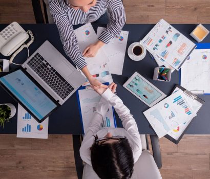 top-view-of-business-women-shaking-hands-in-corpor-2023-11-27-05-36-45-utc-1.jpg top-view-of-business-women-shaking-hands-in-corpor-2023-11-27-05-36-45-utc-1.jpg